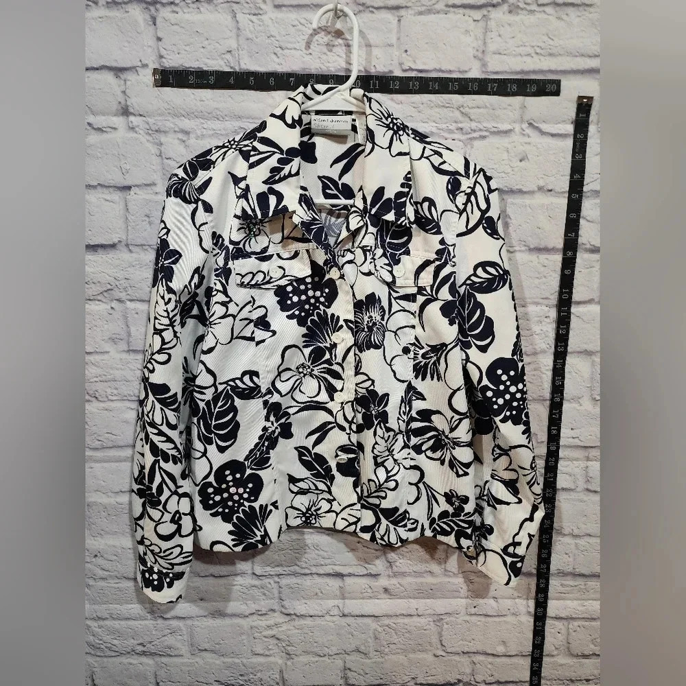 Alfred Dunner white jacket with navy blue floral design and sequin embellishment